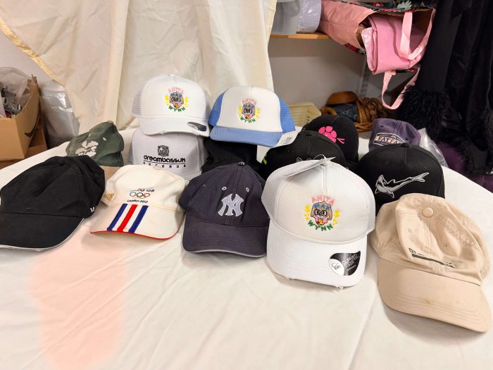 Various brands of hats